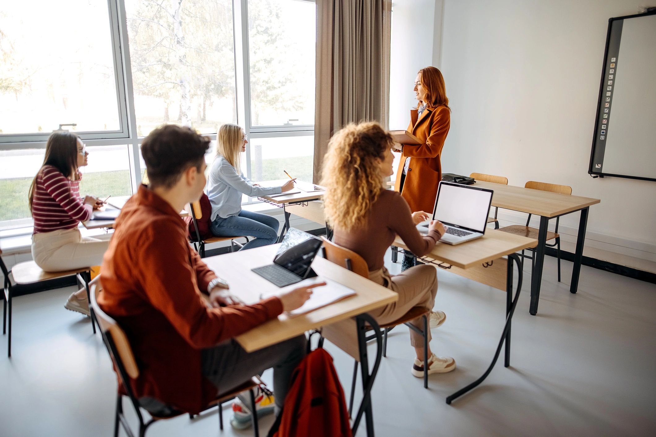 modern classroom with students and teacher