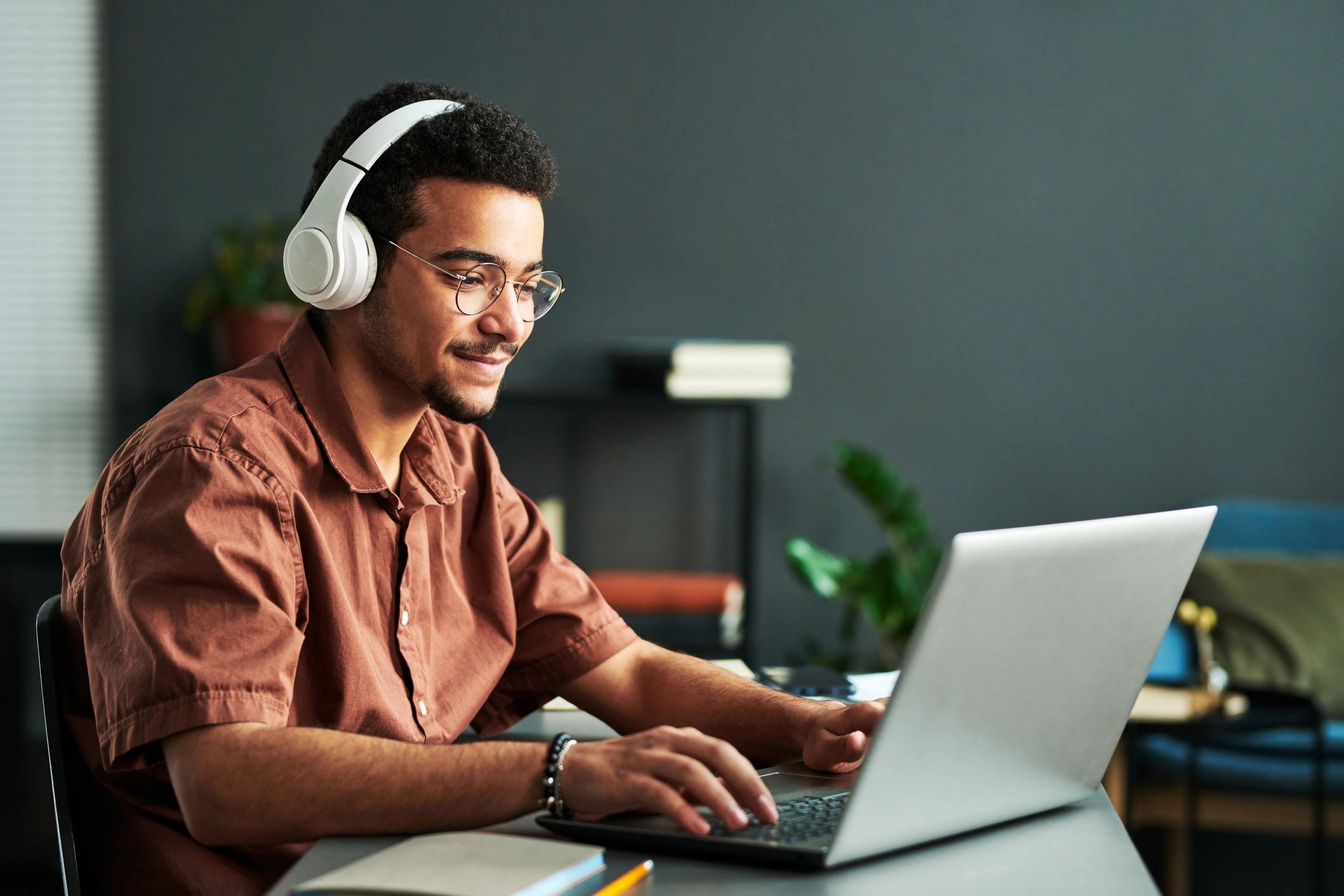 student technology laptop headphones